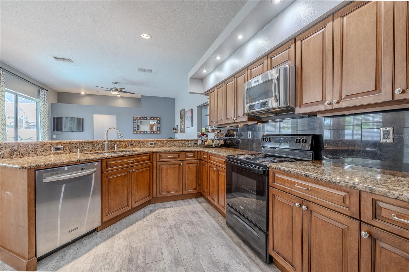 The kitchen is open to the family room.