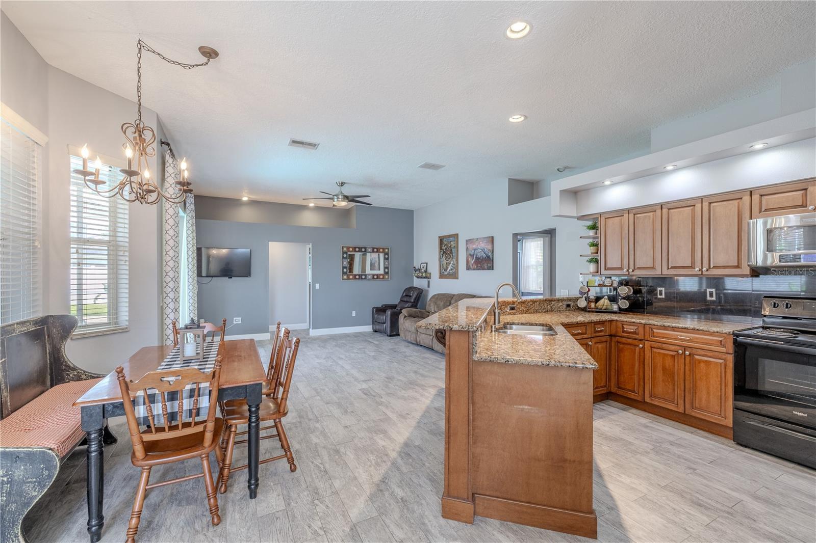 The breakfast nook and kitchen are open to the family room.