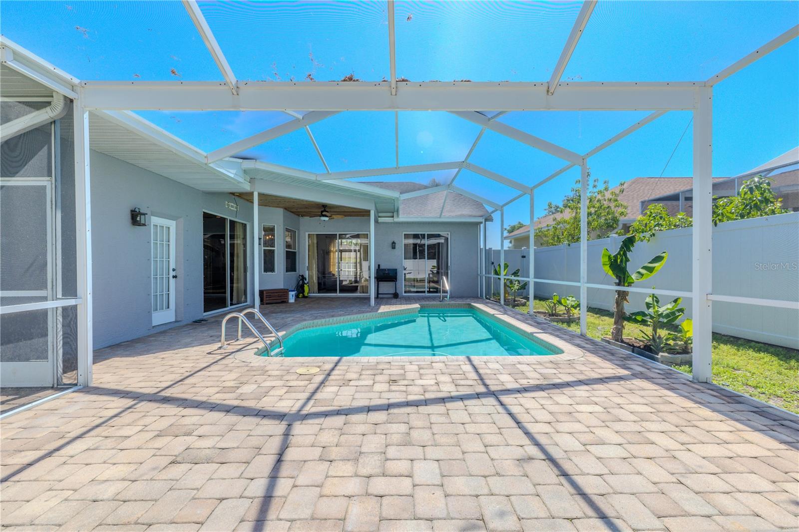 The pavered pool deck