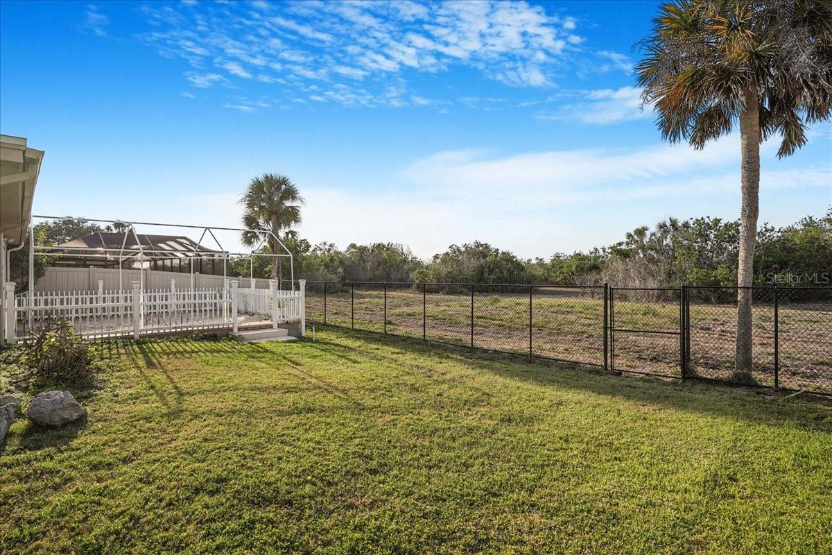 backyard has gate access to conservation area