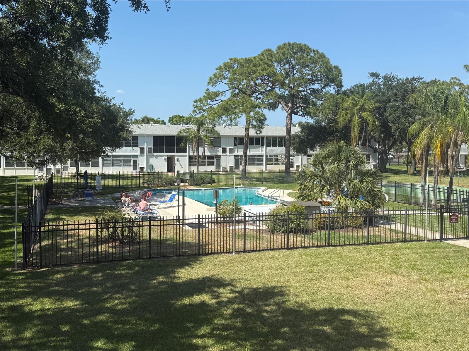 View of the courtyard and pool from the Florida room.
