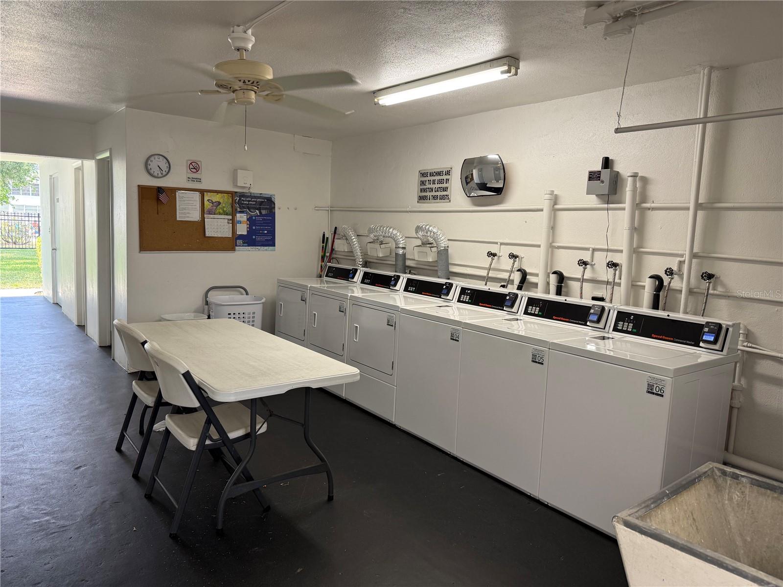 The laundry area is clean & large.