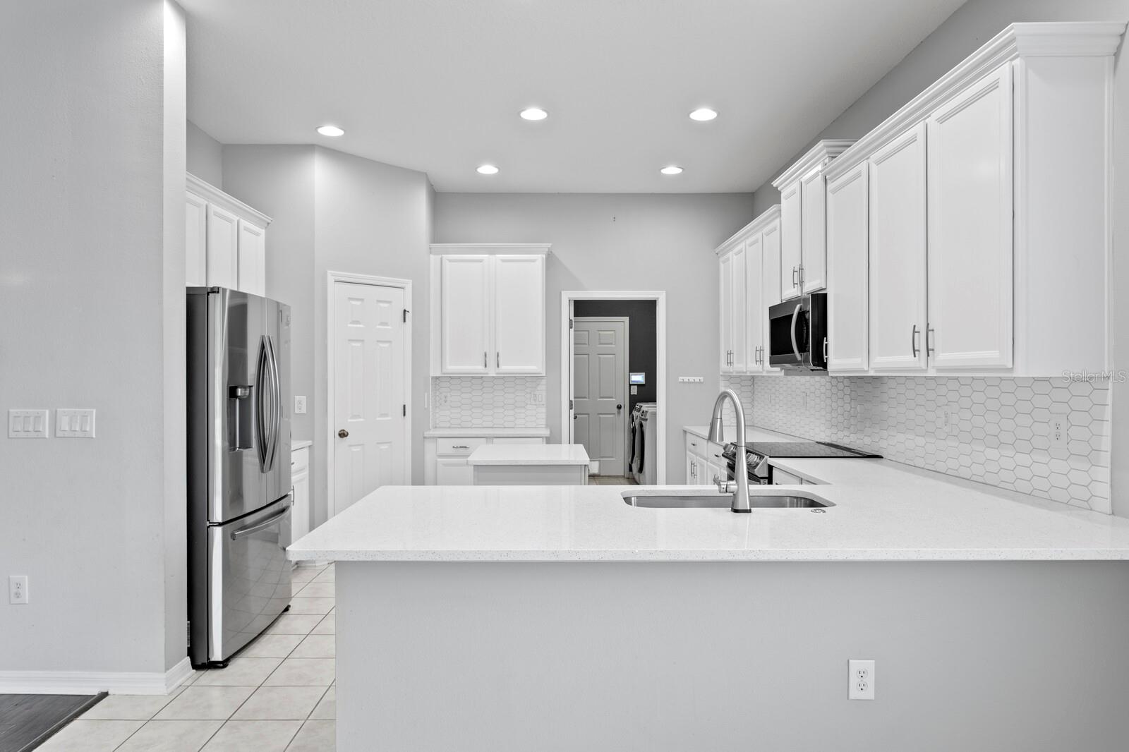 The updated kitchen is nice and crisp