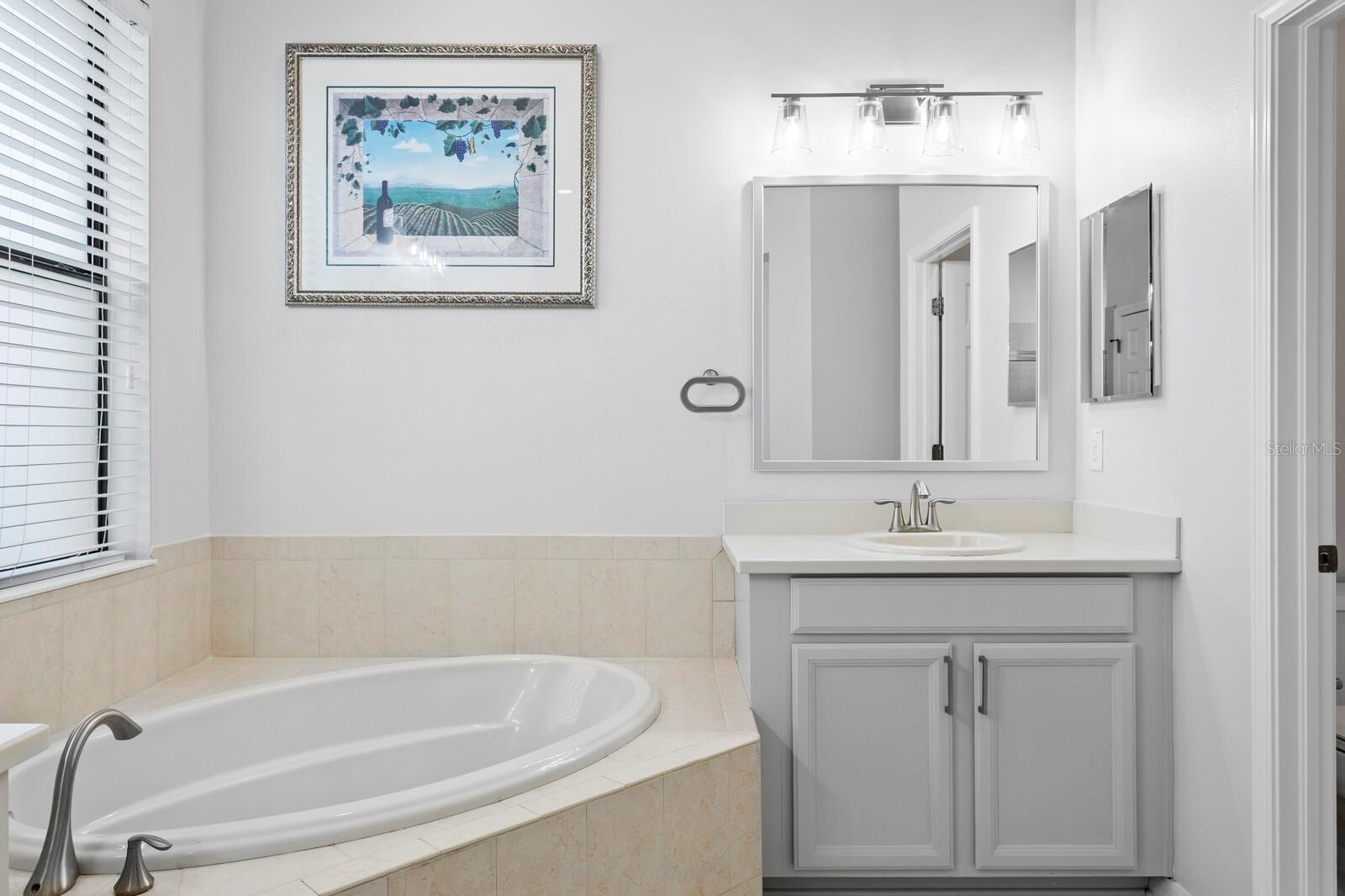 There's a large soaking tub in the primary bath