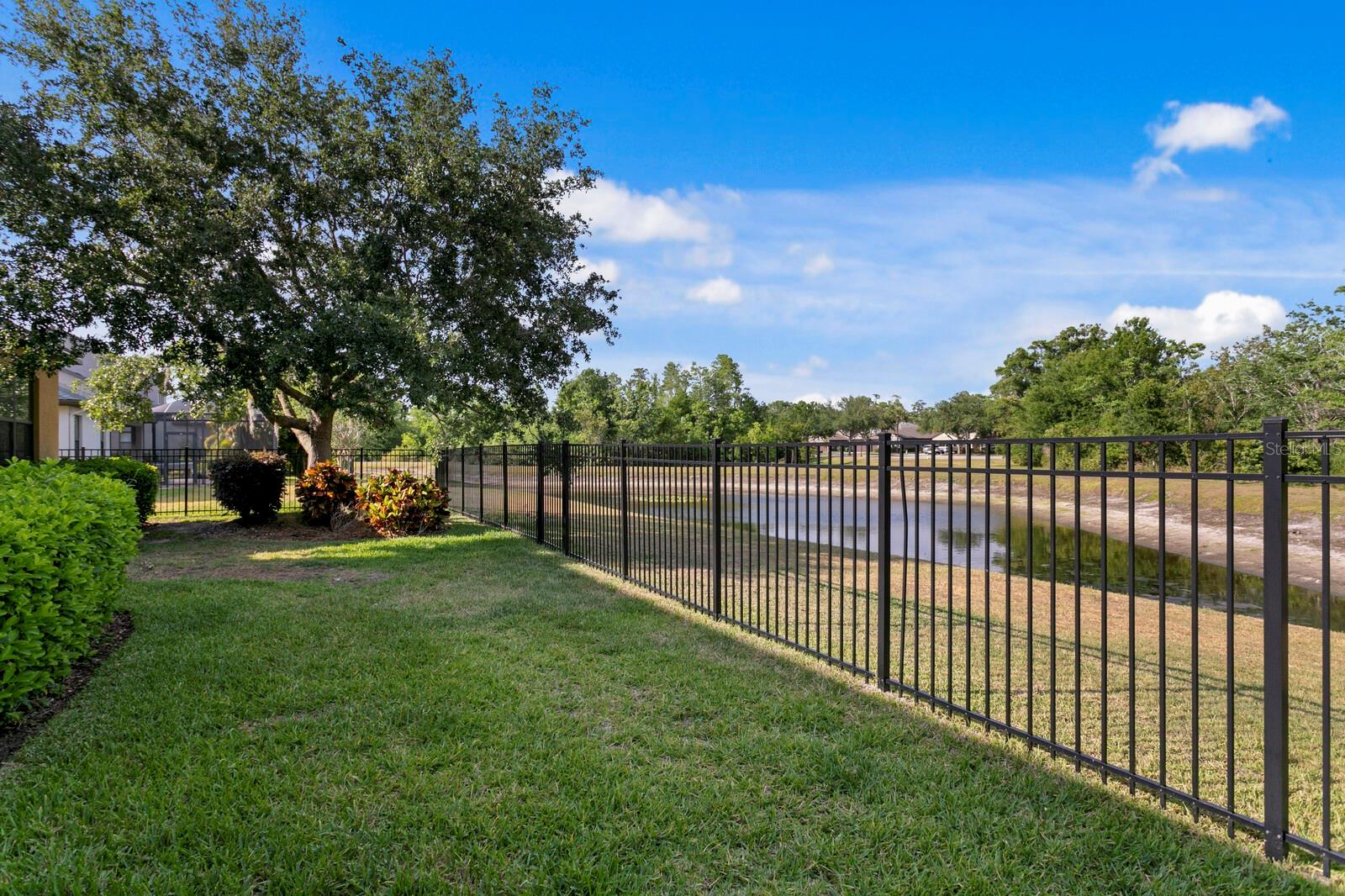 Enjoy the privacy of water & conservation views along with no rear neighbors