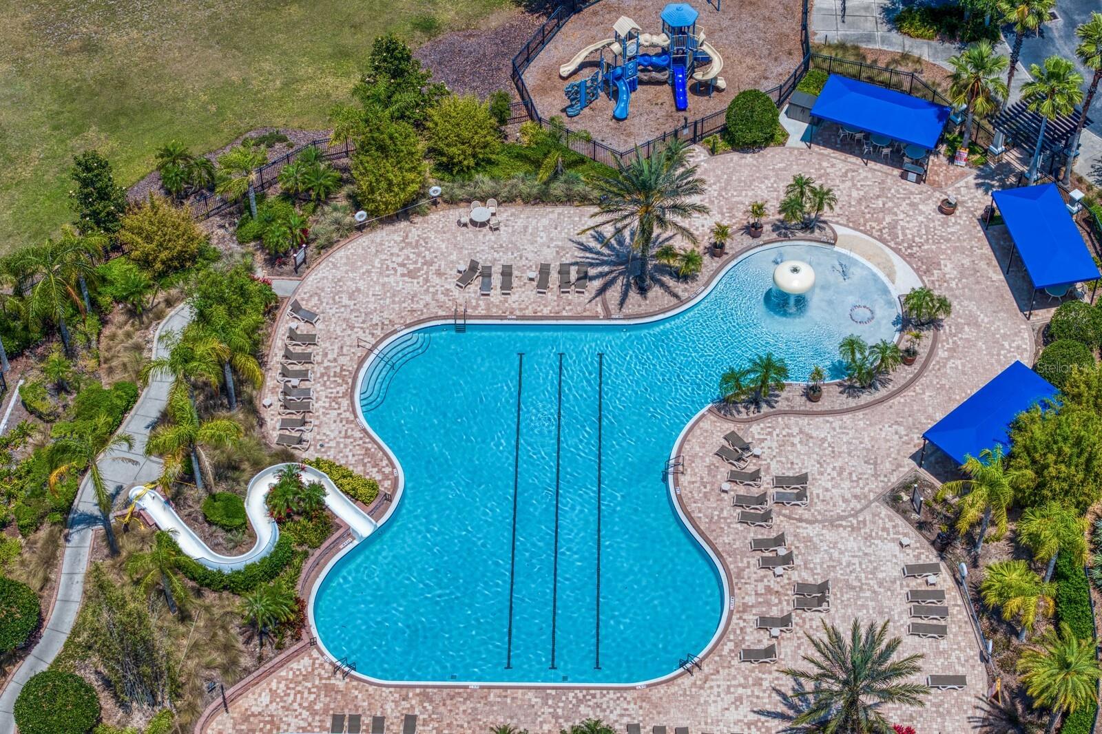 Swim laps in the community pool