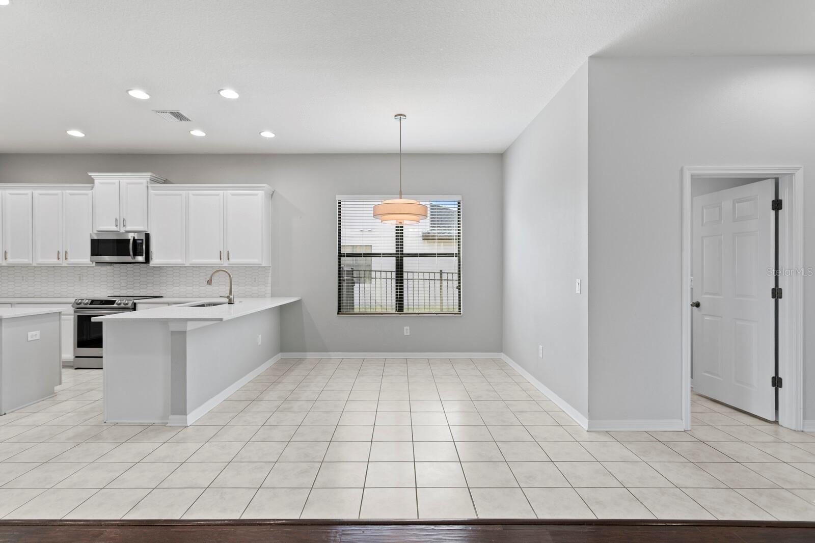 The kitchen is very light & bright