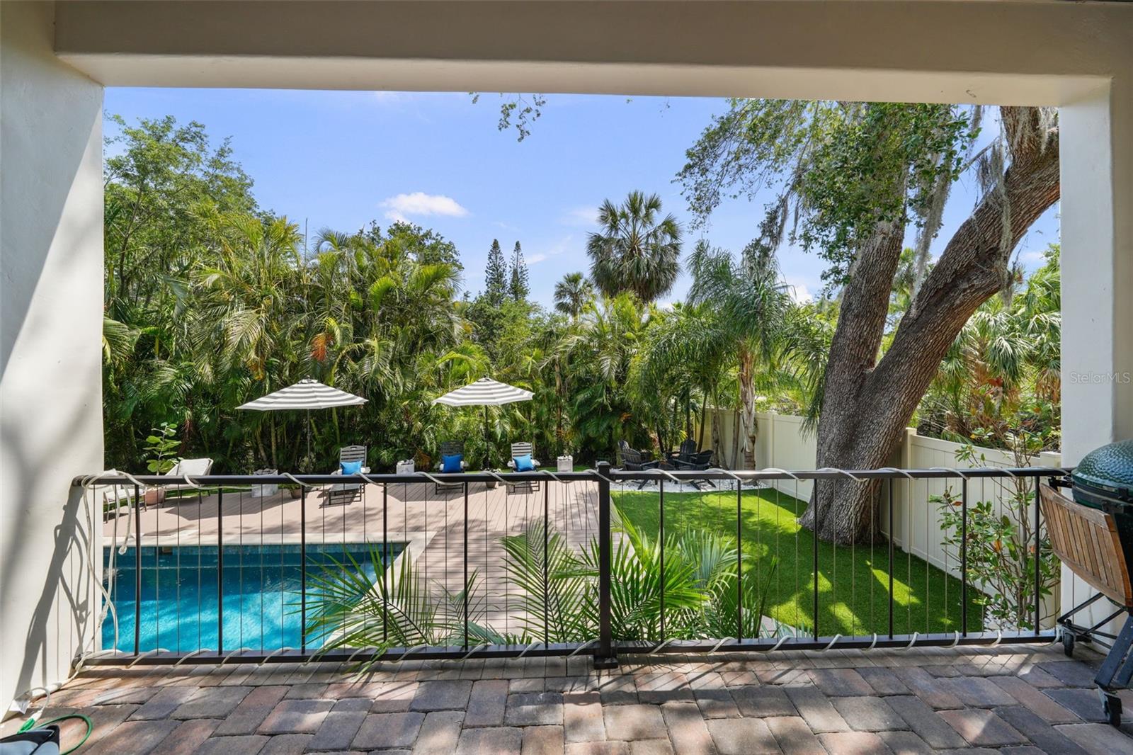 French doors off kitchen and family room lead to back patio