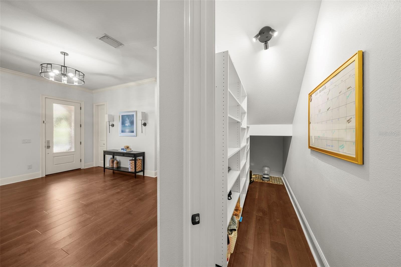 The home features amazing storage including an under stair pantry