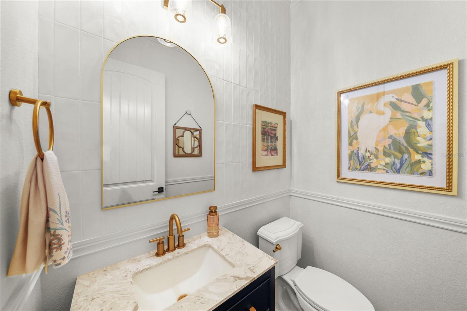 Powder bath is by exterior door to side yard and pool
