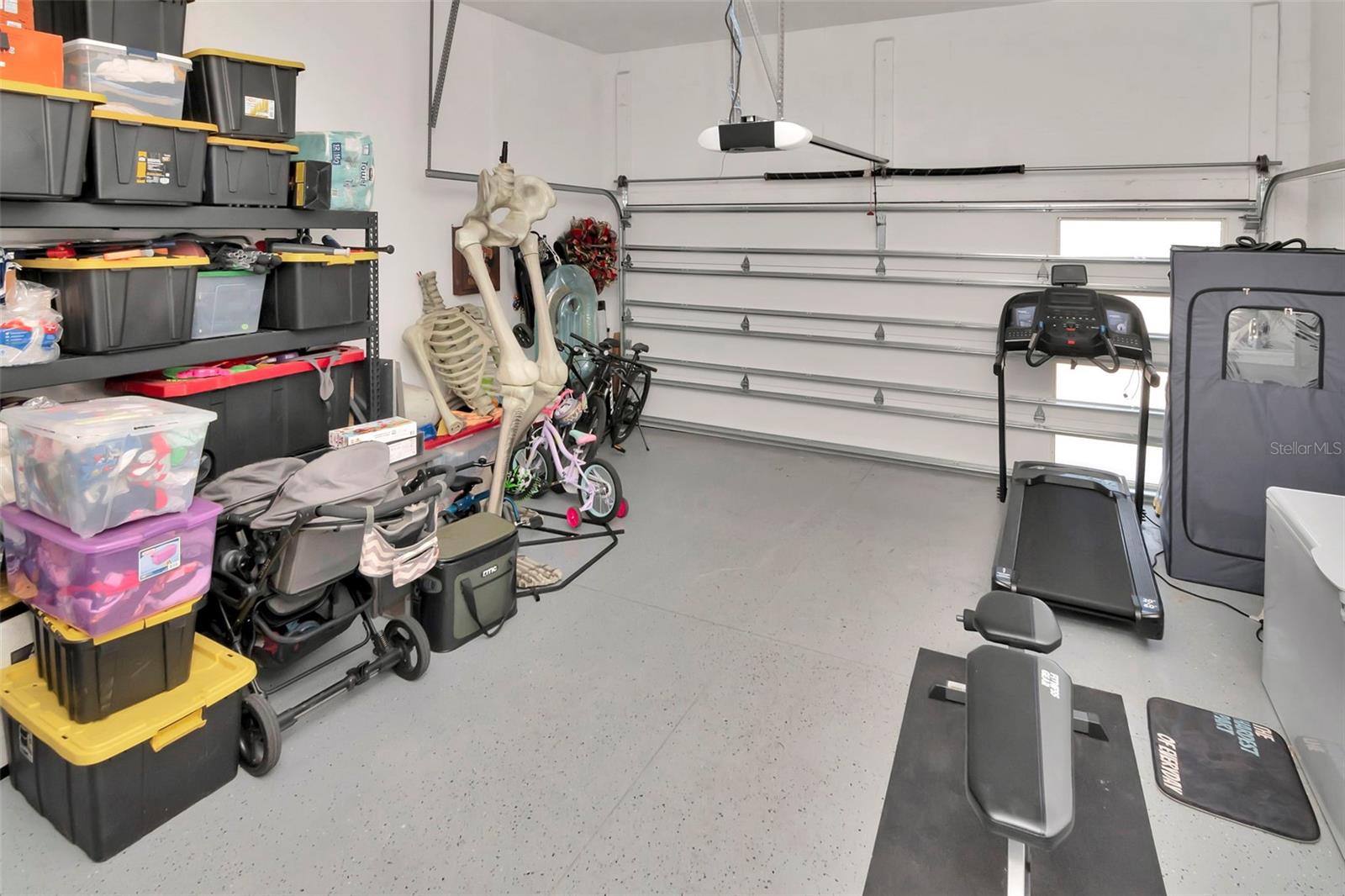 2 Car Garage with additional refrigerator