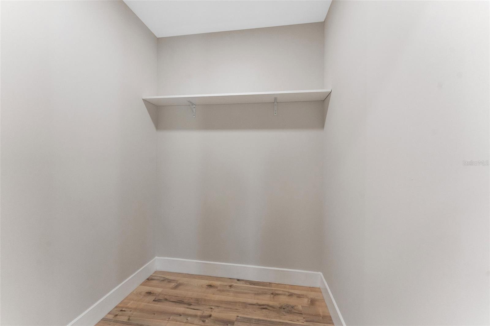 En-suite primary walk-in closet