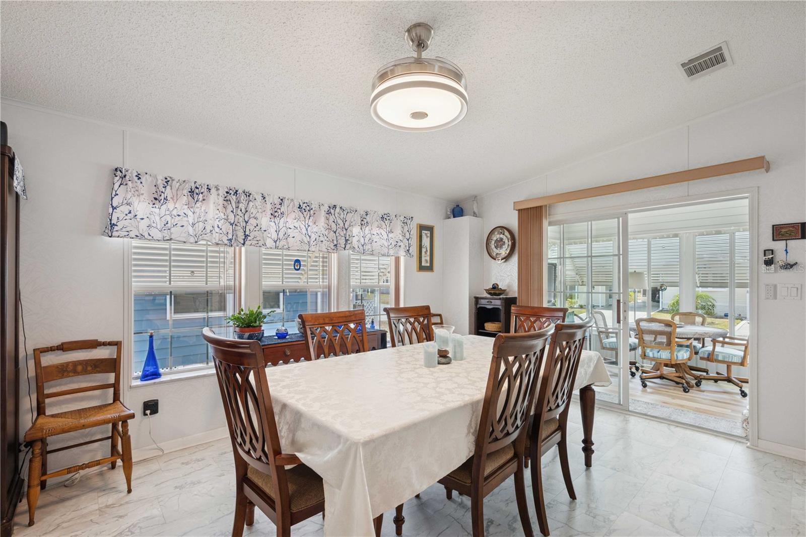Updated flooring, ceiling fan, and much more.