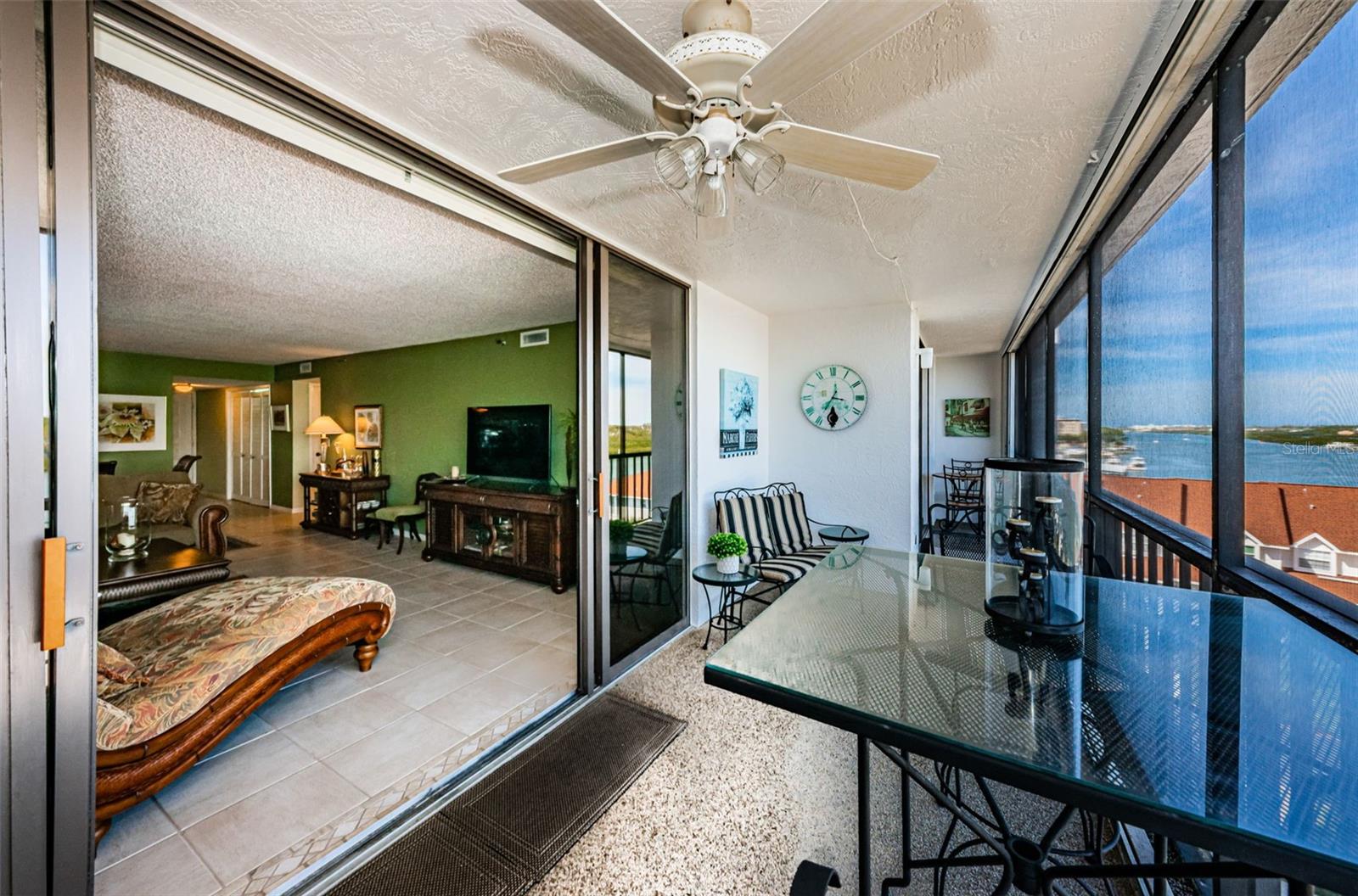 Spacious long balcony with direct and panoramic water views.