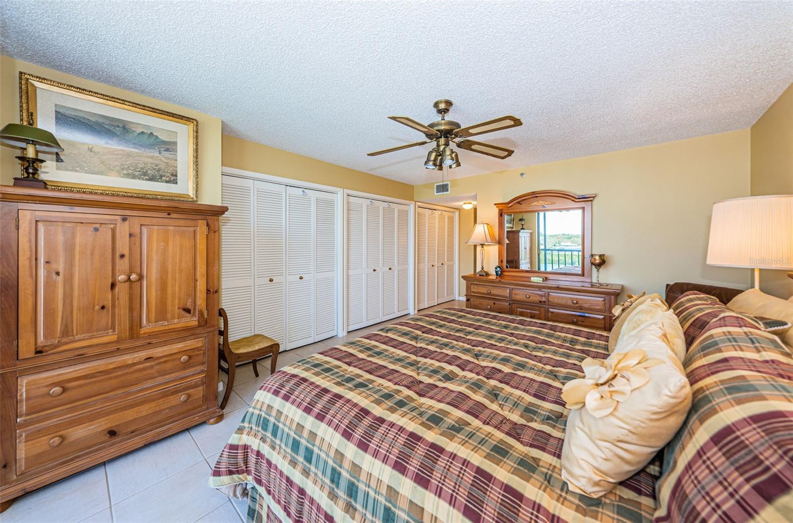 Spacious master with lots of closet space. Currently fitted with king bedroom set - condo is being offered furnished.