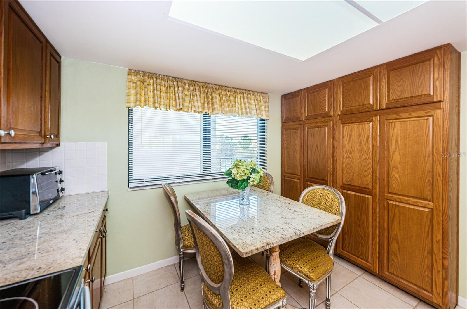 Eat in kitchen, impact window with gulf views. Large built in pantry for extra storage!