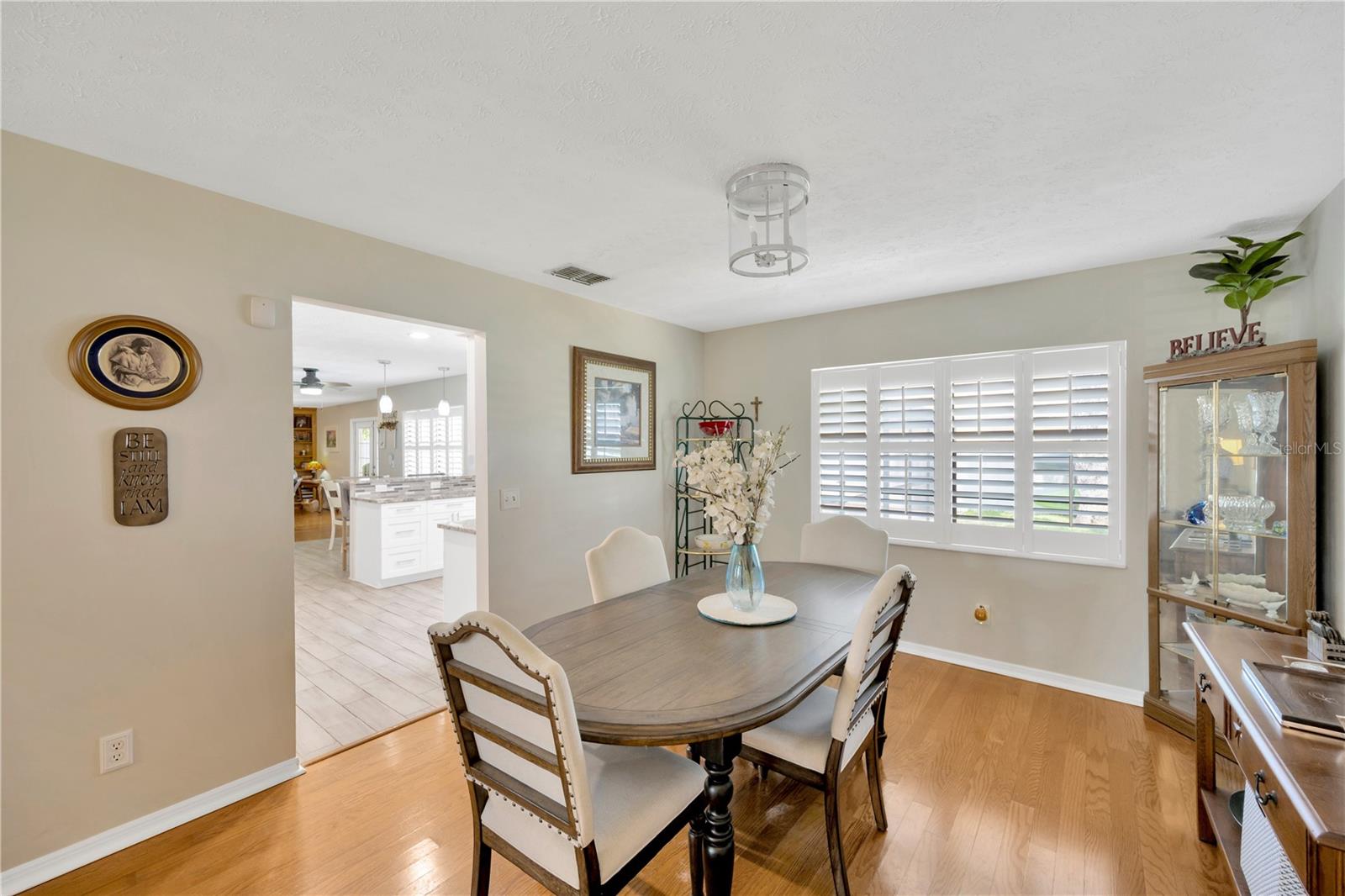 The Dining room is steps from the Kitchen.
