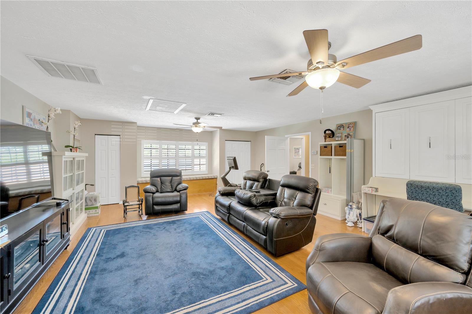 There is a built-in full size Murphy bed in the bonus room that will convey to the buyers providing a flexible area for guests.