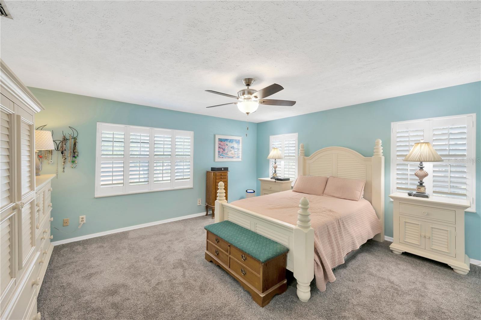 The spacious owner’s suite is a true sanctuary, offering ample windows and lots of room & privacy.