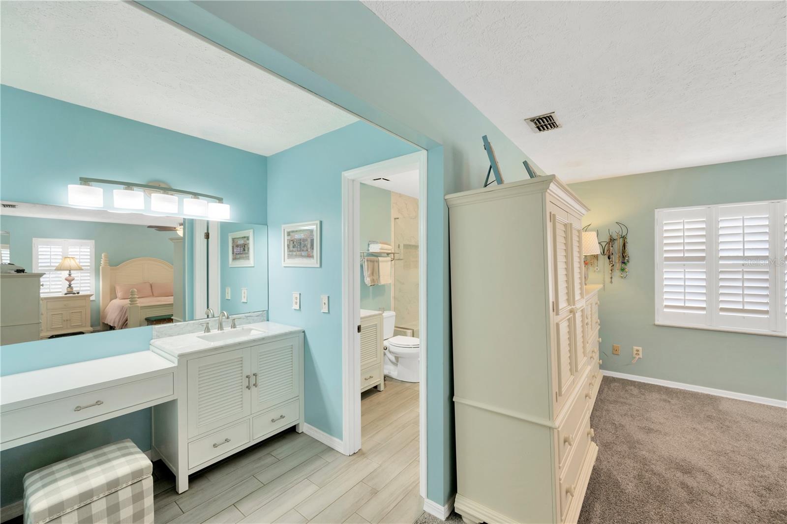 The primary ensuite bathroom with two vanities for maximum flexibility.