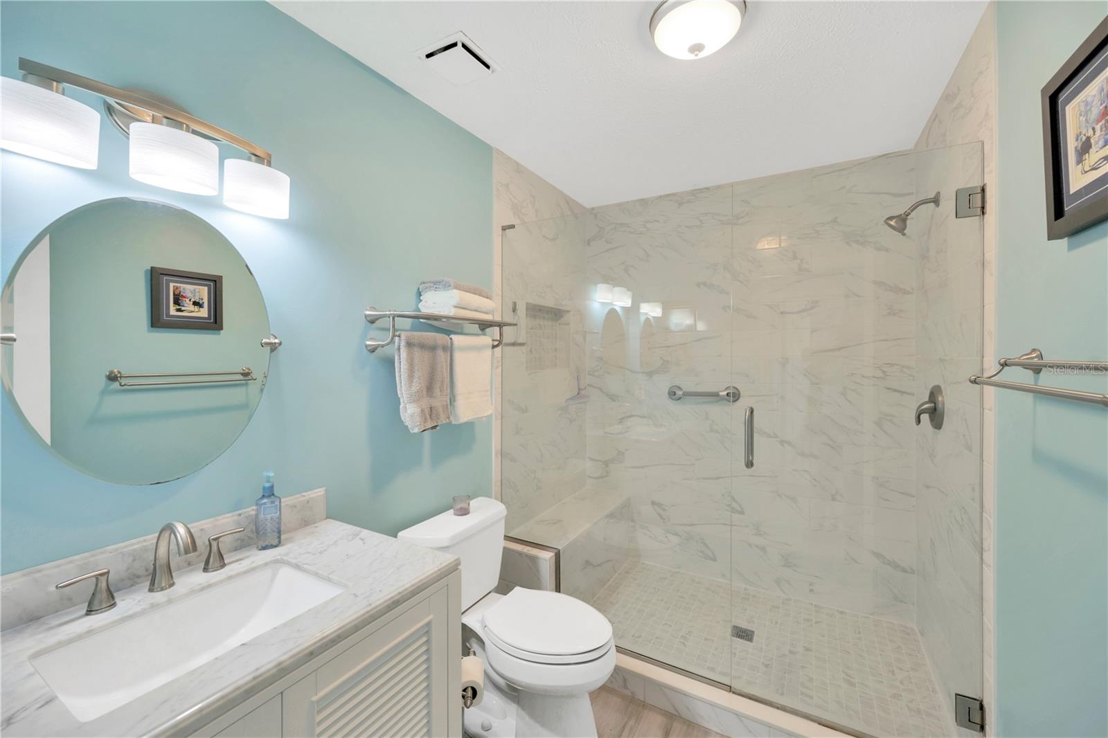 Vanity #2 is inside the recently remodeled primary bathroom with stylish oversized shower.