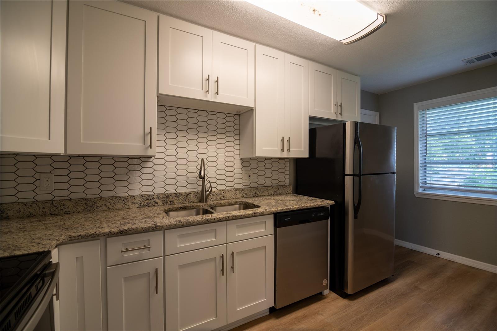 Kitchen with granite countertops