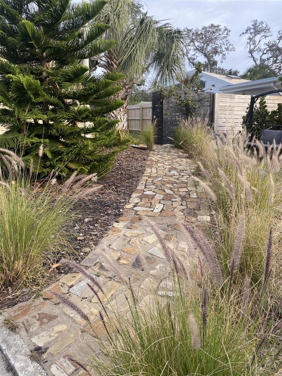 Side entrance to back yard