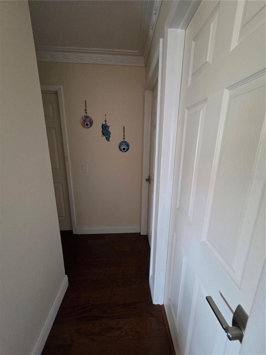 split plan hallway with 3 bedrooms