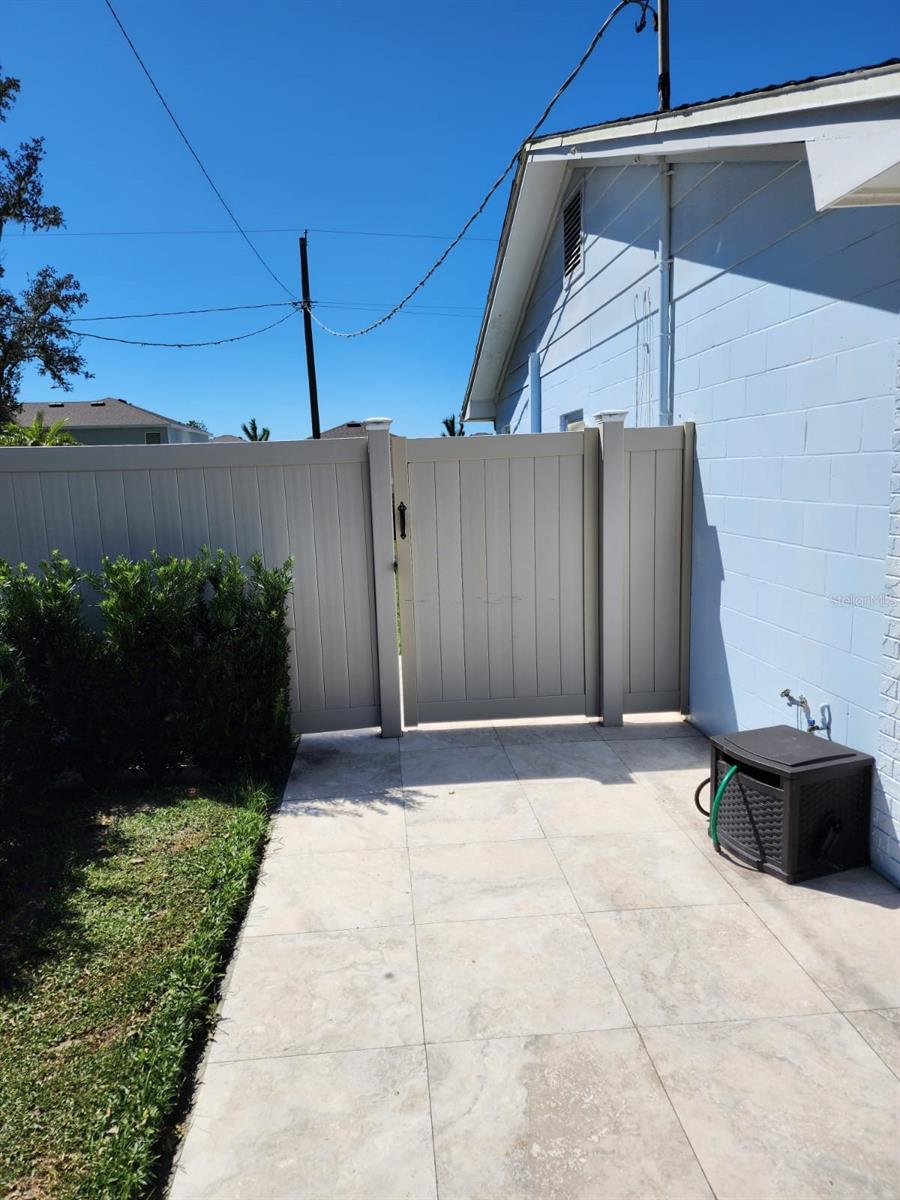 Side entrance to yard