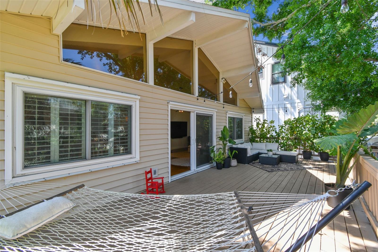 Huge balcony off living room -wow, those windows!!