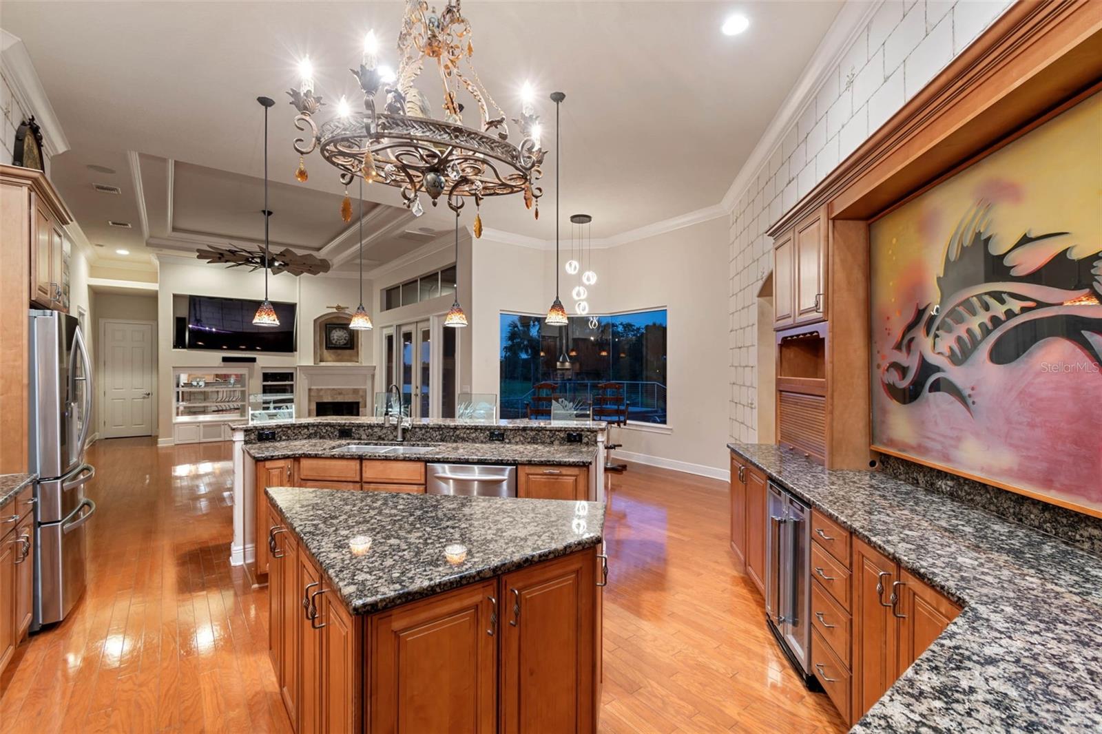 Kitchen and family room after the sun has set.