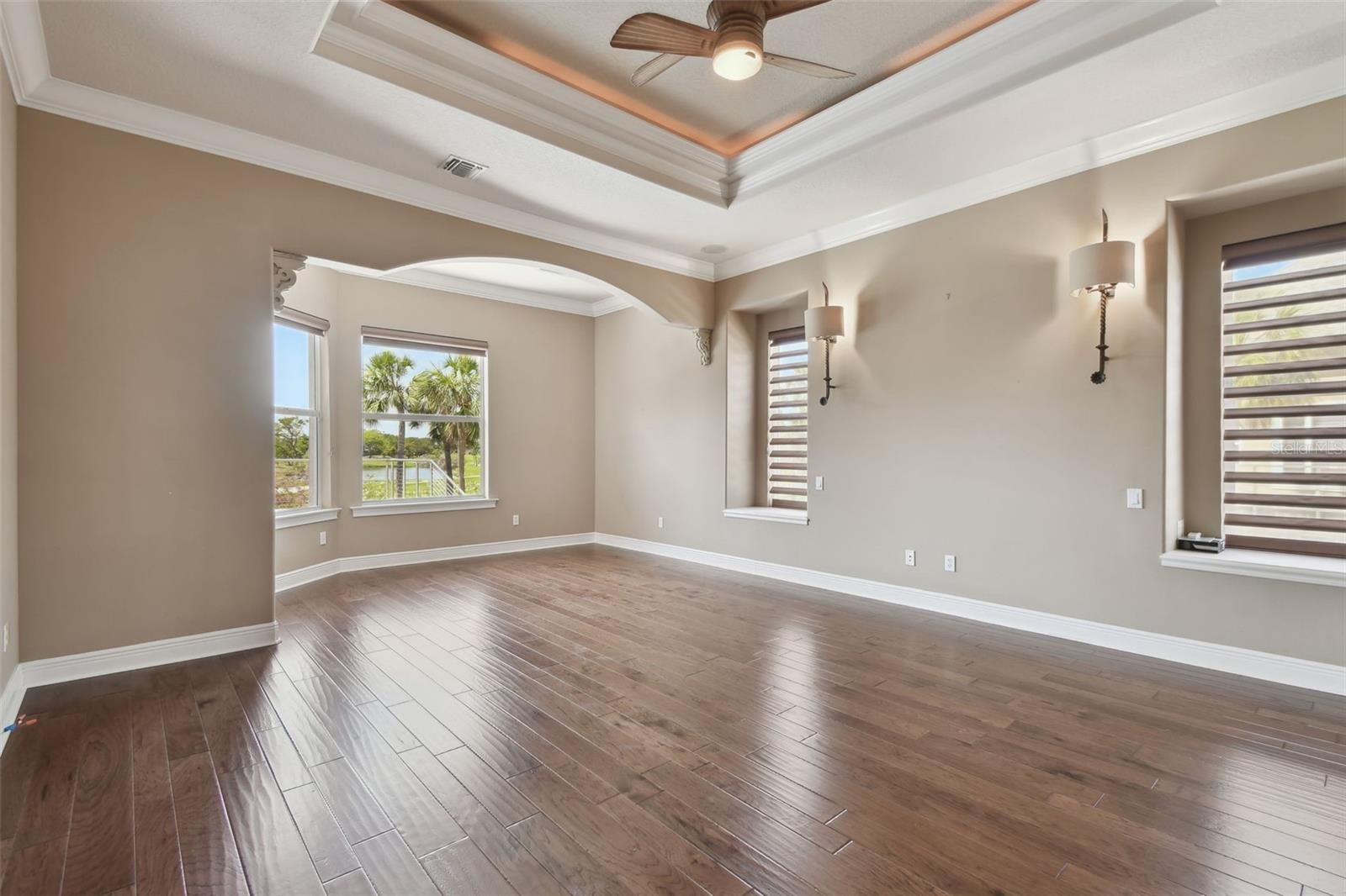 The primary bedroom is large and overlooks the golf course.