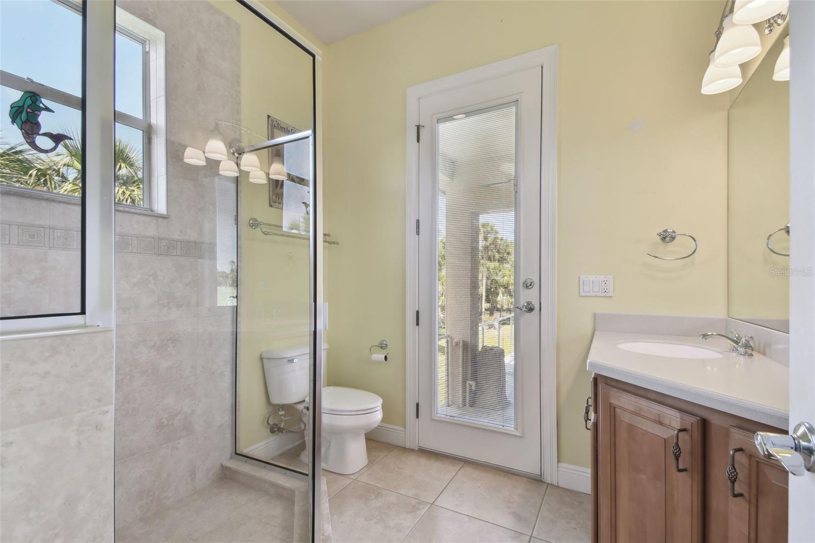 Door outside to swimming pool.