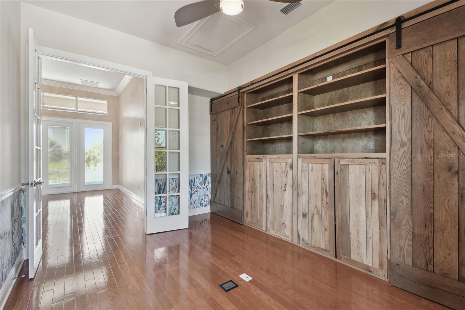 Office with built in bookshelves.