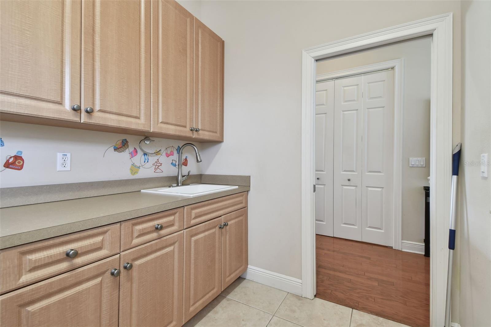 Door to Hallway with Pantry Closet on the other side.