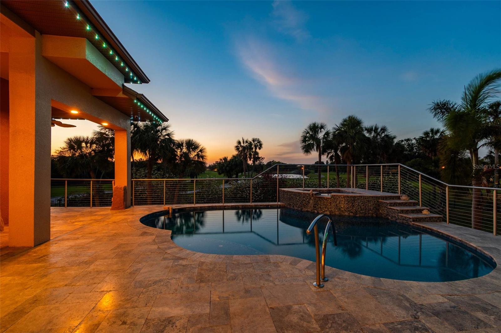 Enjoy the twilight on your pool deck.
