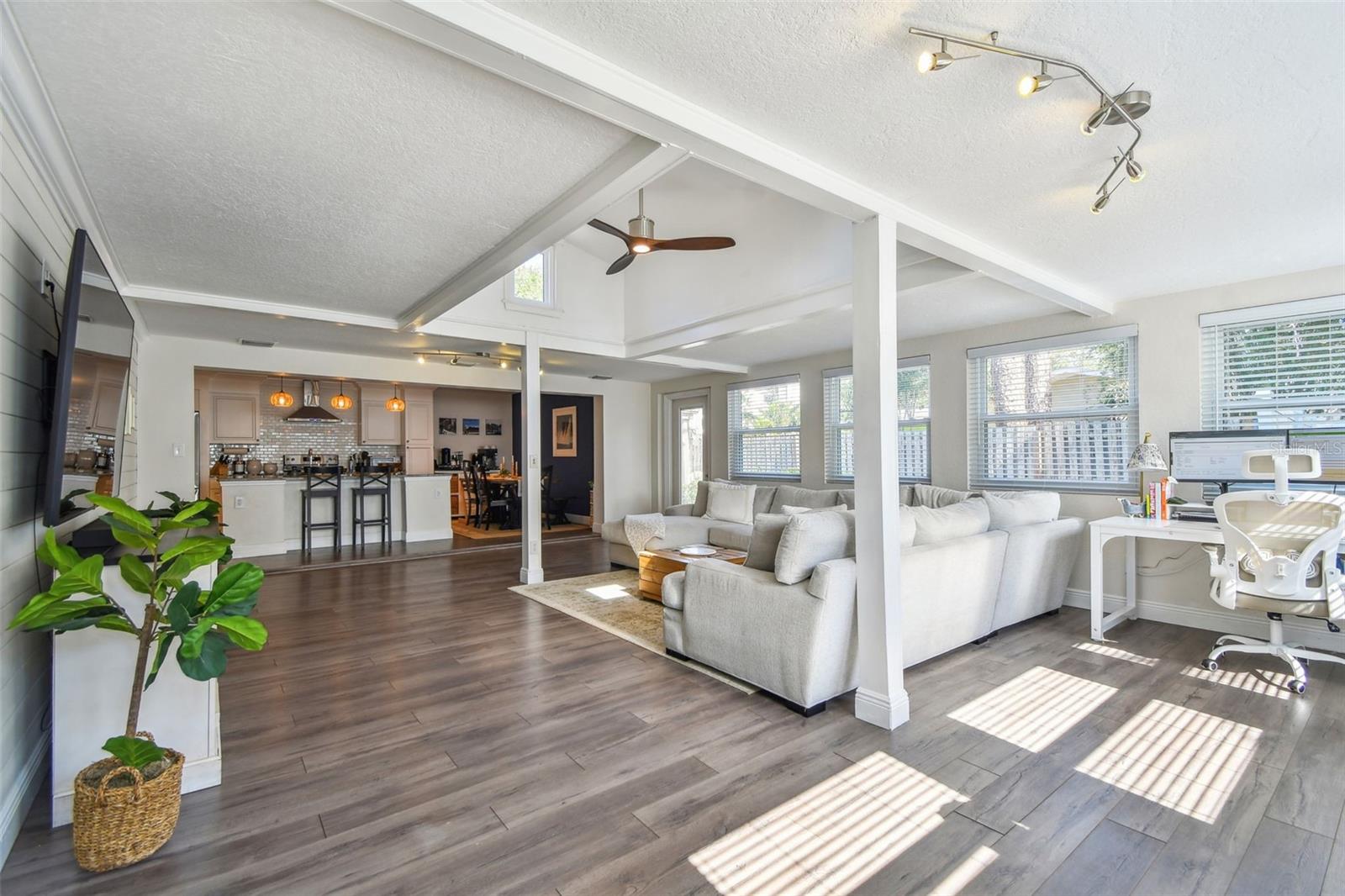 This home contains a very open floor plan- photographed here, the kitchen opens up into the great room