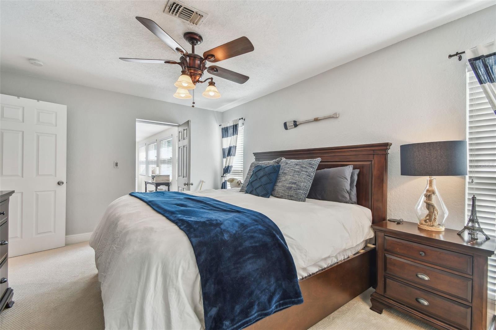 Primary bedroom is light and bright and has another ENORMOUS walk-in closet along with an en suite bathroom.