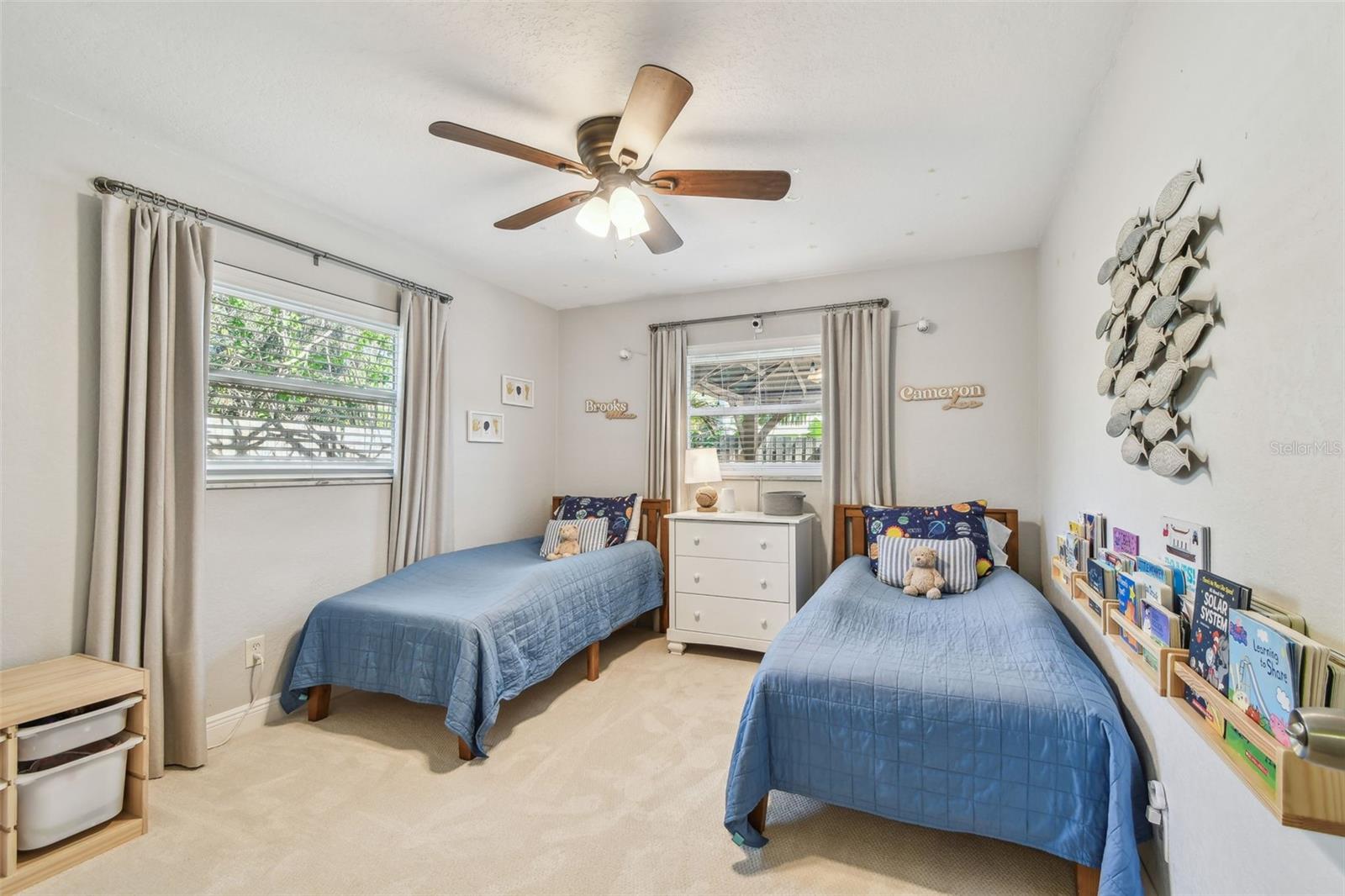 4th bedroom - new windows, new carpet!  All ceiling fans and custom lighting conveys.