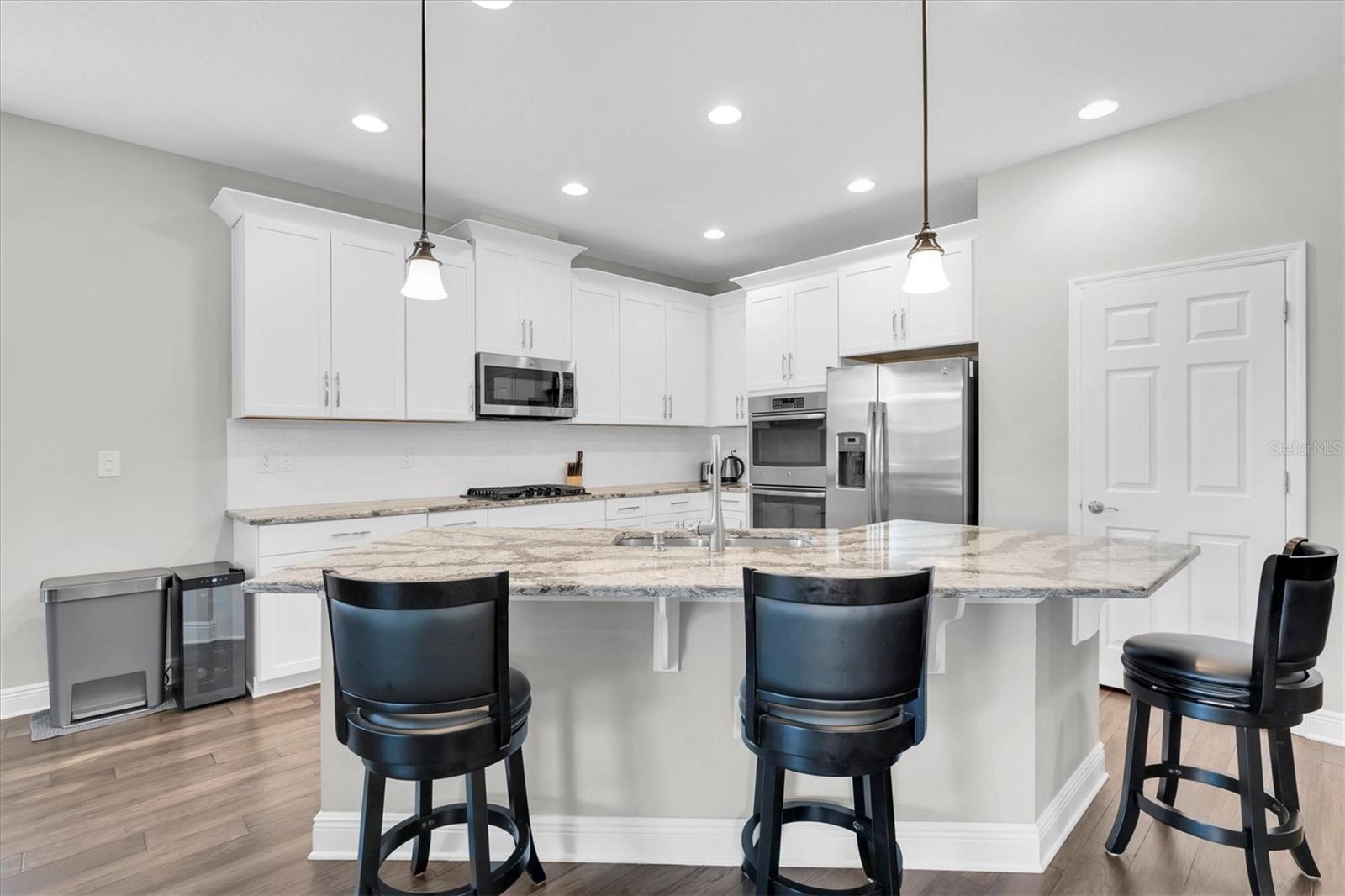 BEAUTIFUL CHEFS KITCHEN WITH MASSIVE ISLAND