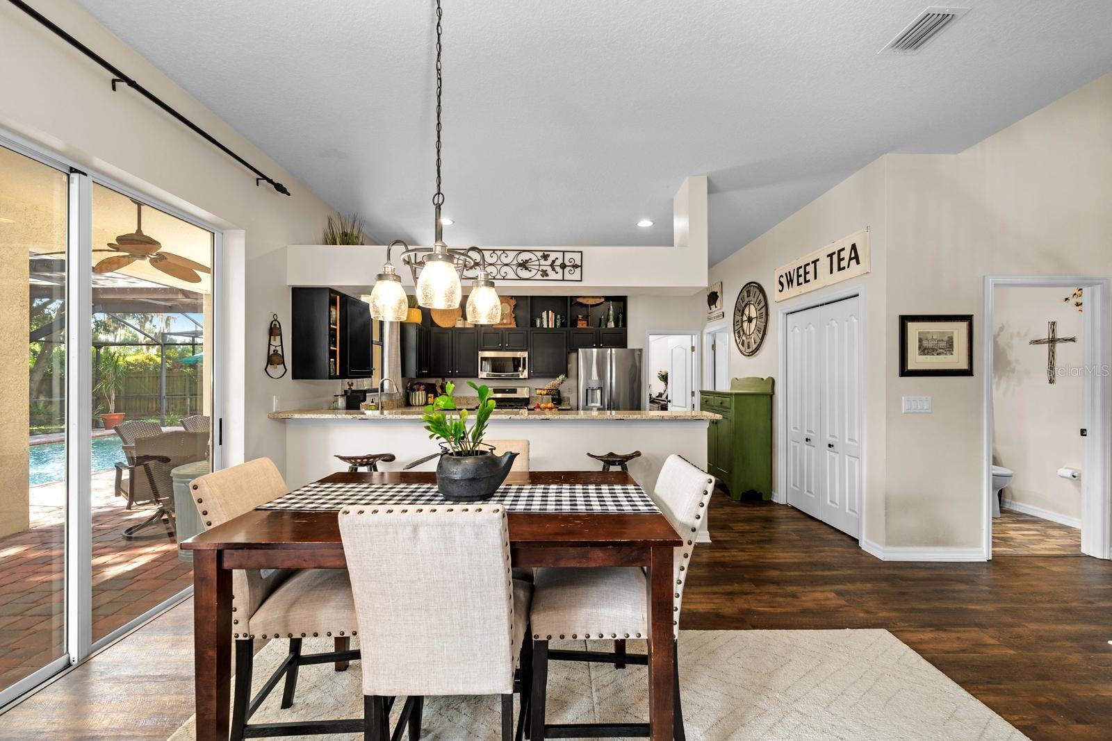 There's so much space in the family room, you can use this space for a table....or use it to expand the family room/living room space.