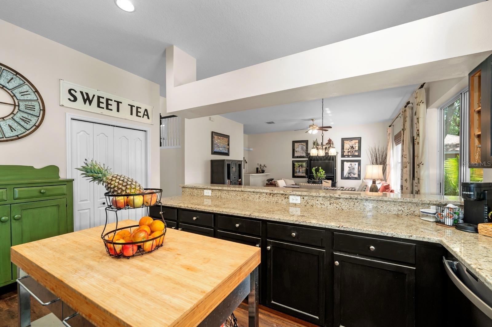 A kitchen with style and flair!  The island will stay and is moveable.