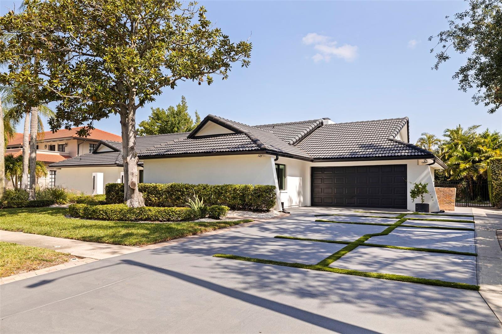 Custom driveway and oversized 2 car garage