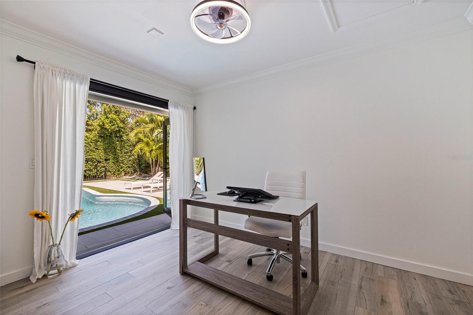 Bedroom 3 opens to pool