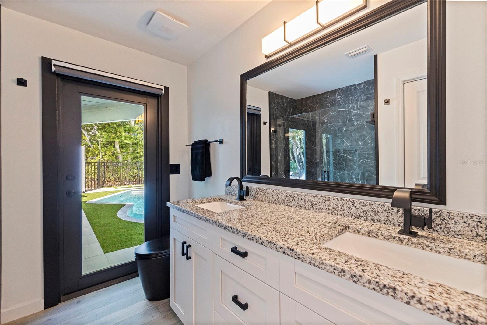 Hall bath doubles as pool bath