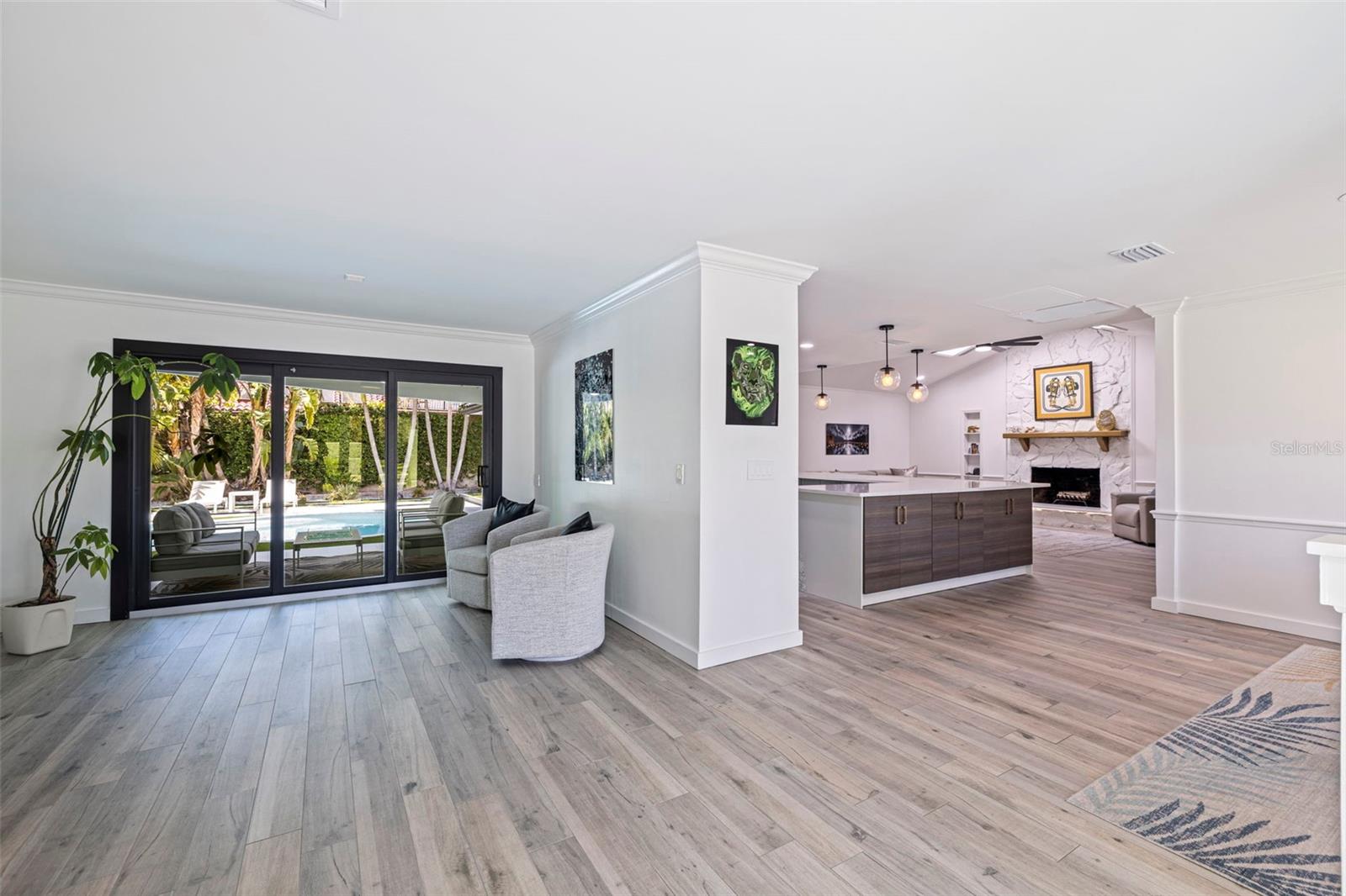 Spacious floorplan seamlessly flows to the private backyard