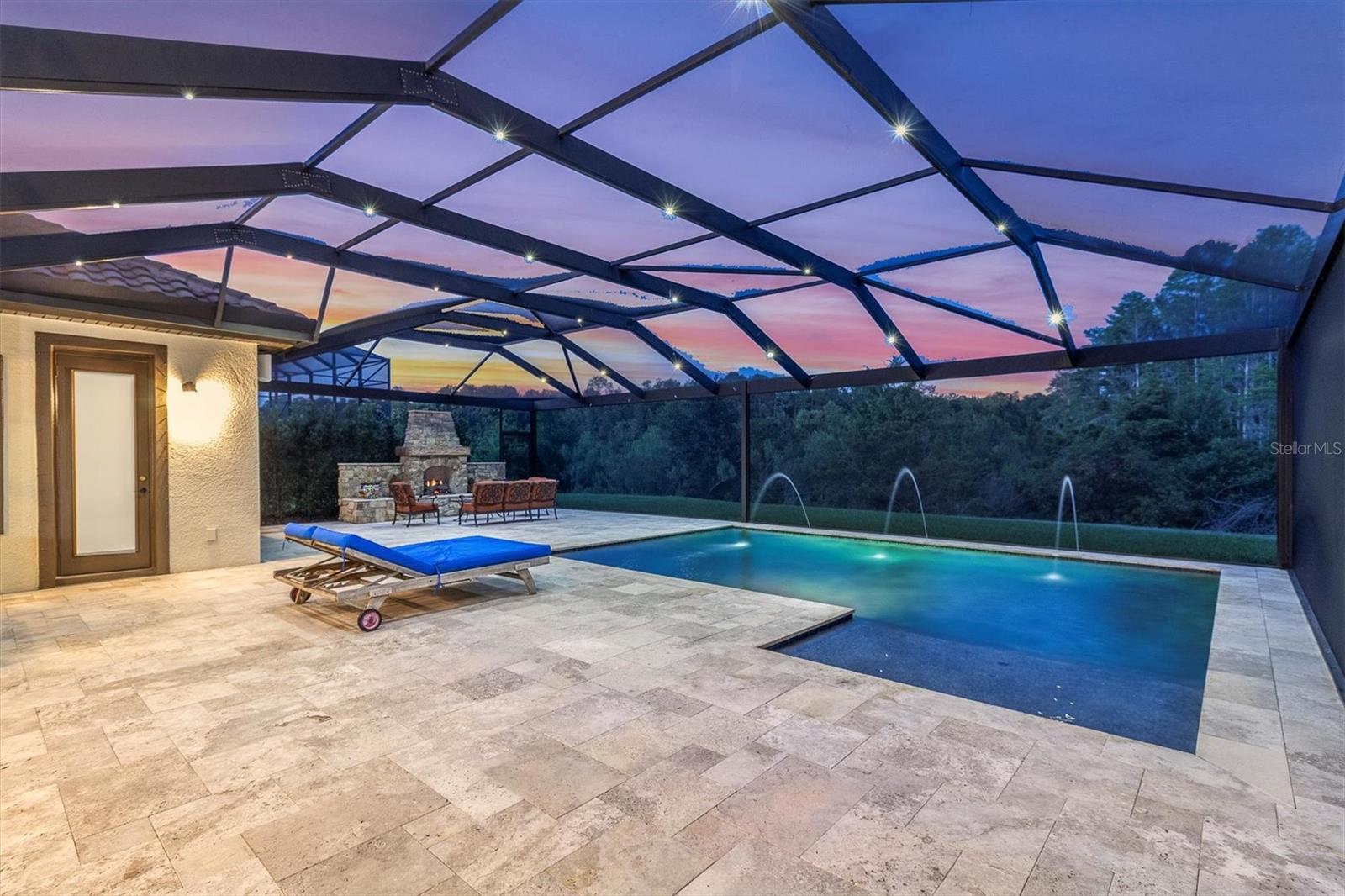 ELEGANT TRAVERTINE, HEATED SALTWATER POOL & VIEWS OF WILDLIFE & NATURE. THIS IS HOME