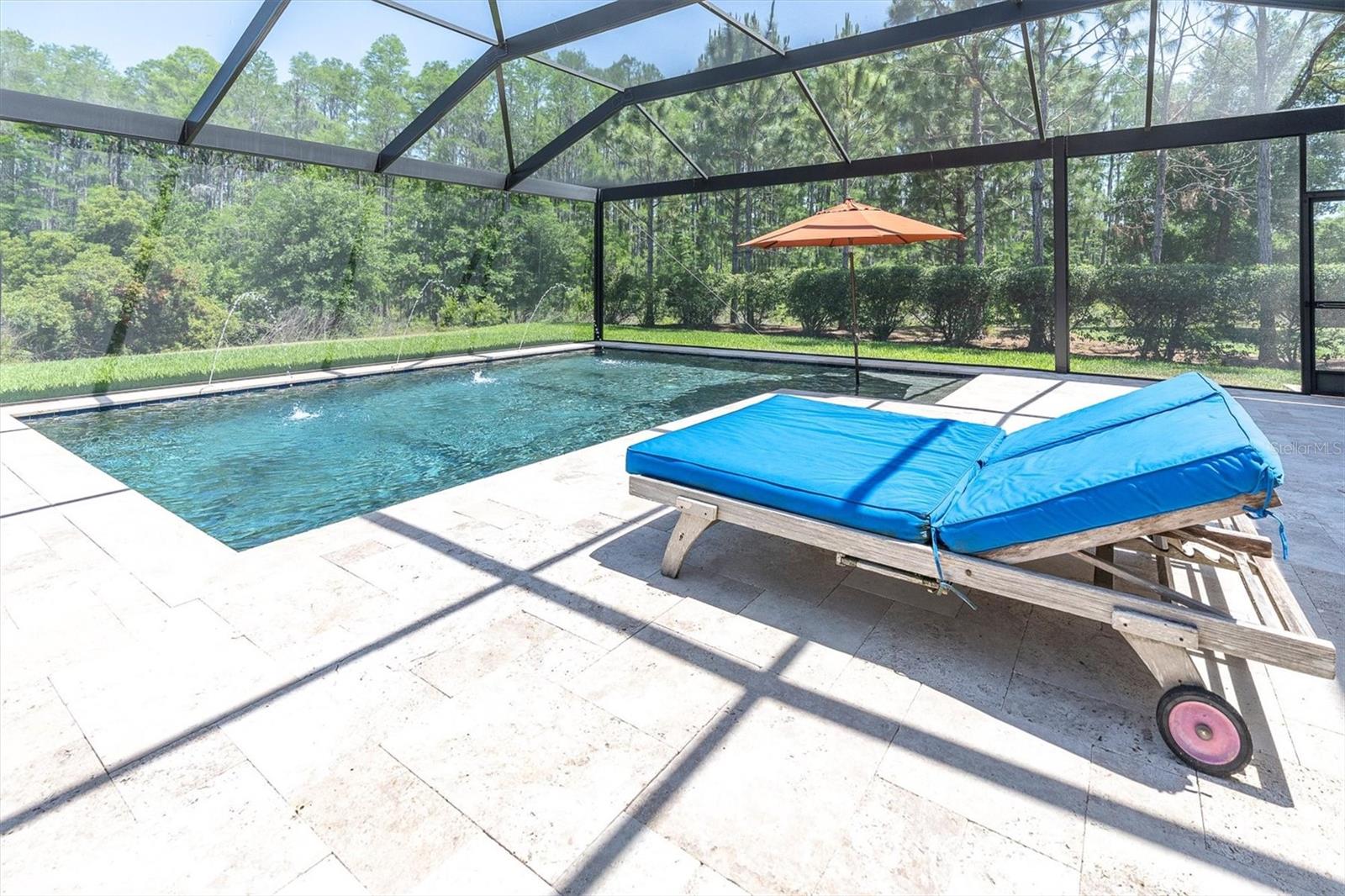 ELEGANT TRAVERTINE, HEATED SALTWATER POOL & VIEWS OF WILDLIFE & NATURE. THIS IS HOME