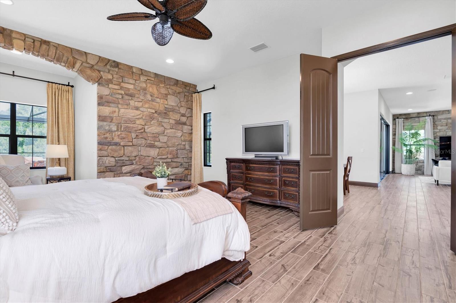 PRIMARY BEDROOM WITH DOUBLE DOORS