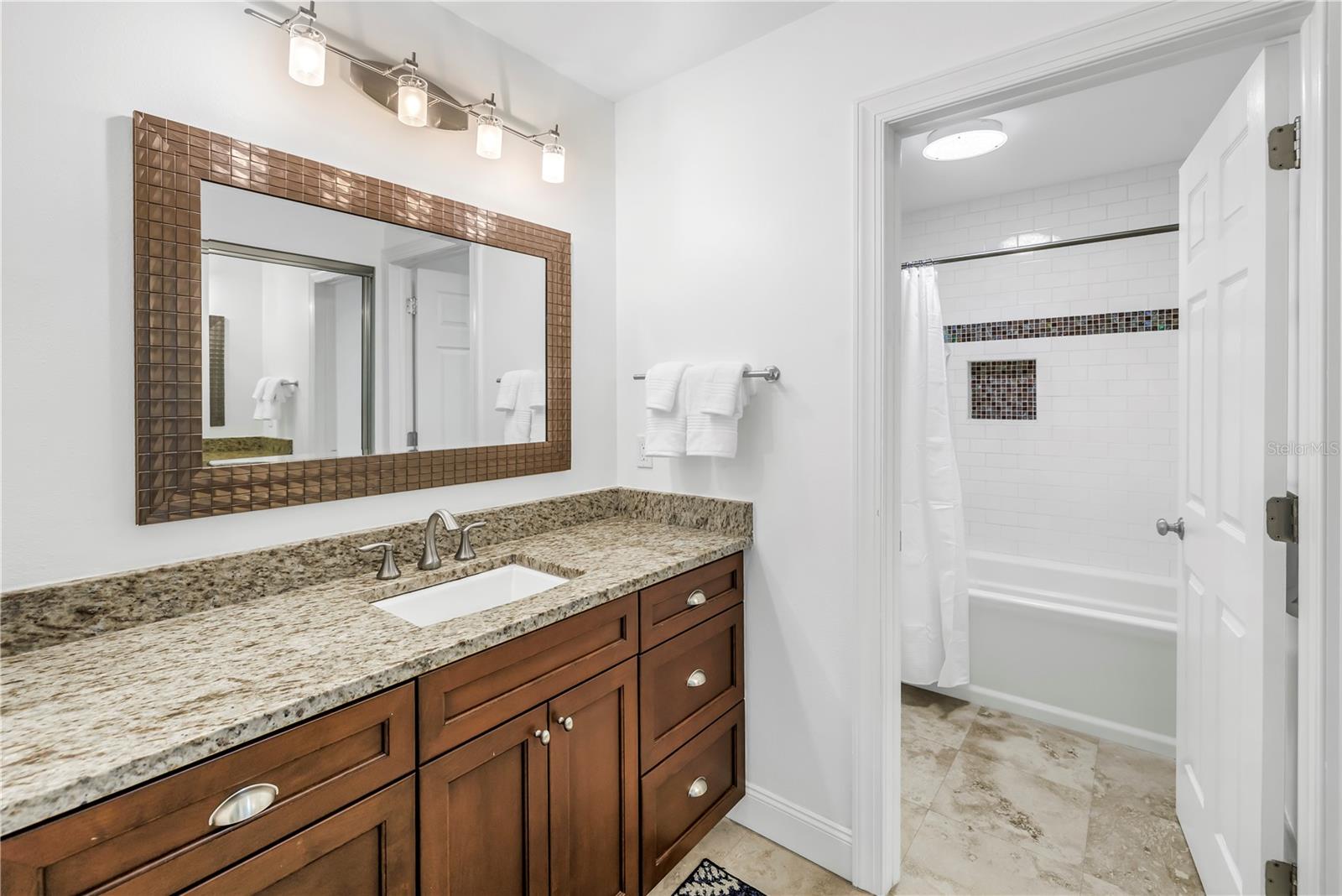Primary Bath en Suite has large Granite Vanity and well appointed closetry